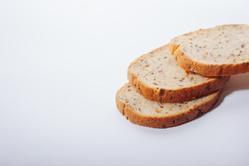 Pieces of bread on a white background.