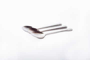 Teaspoons on a white background.