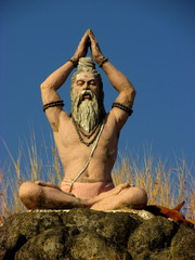 Yoga concept. Pranayama concept. Meditation concept. Statue of yogue in India.
