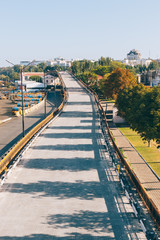 View of the empty road passing into the bridge