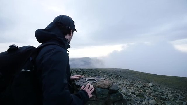 Man climbing Scafell Pike Mountain hiking