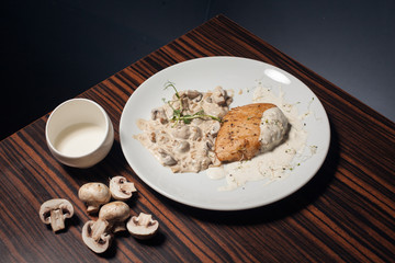 delicious chicken fillet with mushrooms;