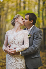 Portrait of a couple in love walking in the autumn Park 83.