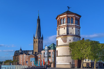 Fototapeta premium Old Castle Tower and st Lambertus church, Dusseldorf
