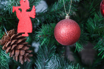 Red christmas ball on the christmas tree.