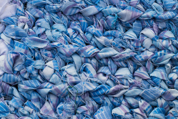 Hand-knitted colorful carpet made of recycled materials