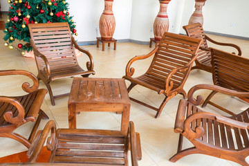 Wooden chairs in interior of colonial style