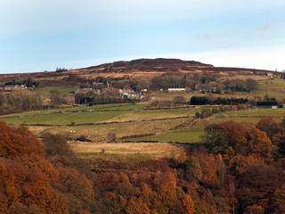 Obraz premium panoramic view of midgley moor near hebden bridge in autumn with surrounding fields and woodland