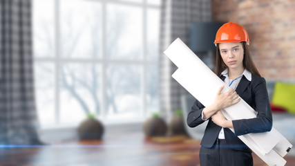 Young beautiful business woman and creative designer standing over blured interior background