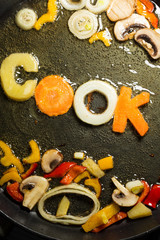 fried vegetables in the form of letters