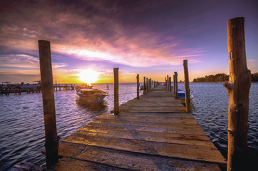 Beautiful sunset landscape with boats at the lagoon of Mesolongi, Greece 