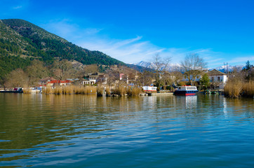 Fototapeta na wymiar The pictursque waterfront of the island of kyra Frosini Nissaki at the lake Pamvotida, Ioannina, Greece.