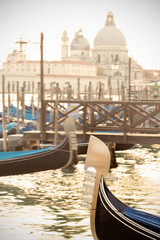 Fototapeta na wymiar Gondola's prow in venetian lagoon.