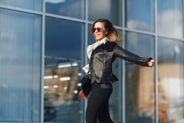 Happy woman with shopping bags