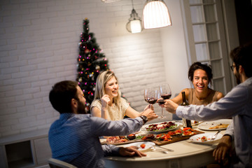 Friends celebrating Christmas or New Year eve