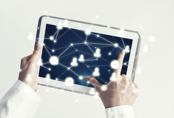 Close of female doctor hands working with tablet pc computer