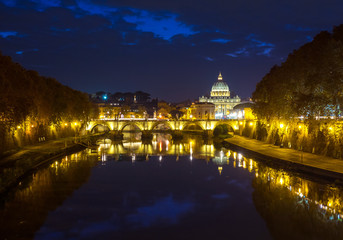 Fototapeta na wymiar Rome (Italy) - The Tiber river and the monumental Lungotevere. Here in particular the Saint Peter in Vatican