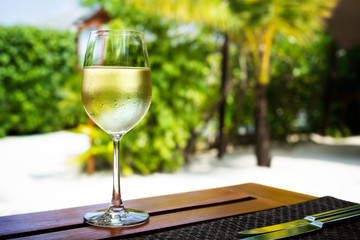 Glass with cold white wine