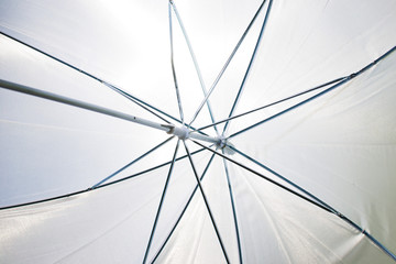 the white umbrella of the photographer from the inside