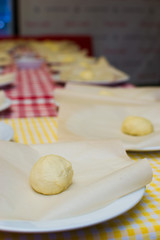 raw closed pizza made by a child