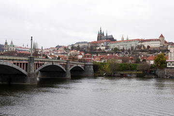 View on the autumn Prague gothic Castle above River Vltava, Czech Republic