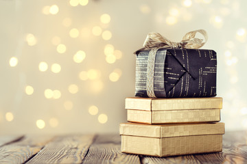 Decorated shiny giftboxes in sparkles