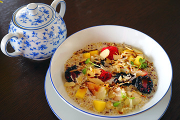 A vegan quinoa porridge with fresh fruit for breakfast 