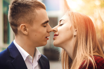 feelings between a guy and a girl. approach of the lips. tender kiss