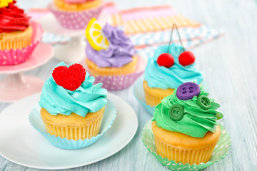 Beautiful cupcakes on wooden table