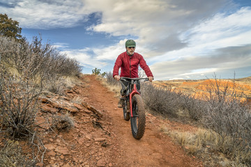 Fototapeta na wymiar riding a fat bike on Colorado foothills