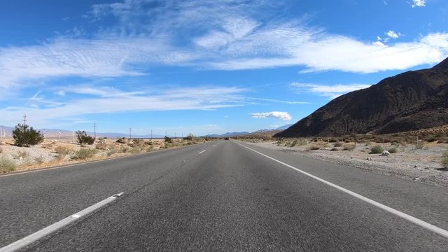 Highway 111 desert driving car mount near Palm Springs in Southern California.