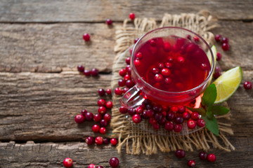 cranberry drink on wooden surface