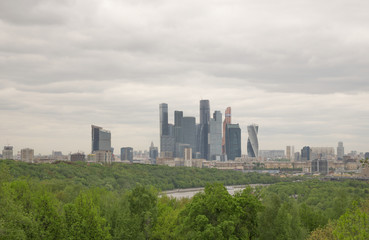 Obraz premium Modern buildings of glass and steel skyscrapers against the sky