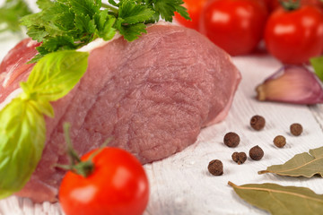  large piece of pork with greens and basil