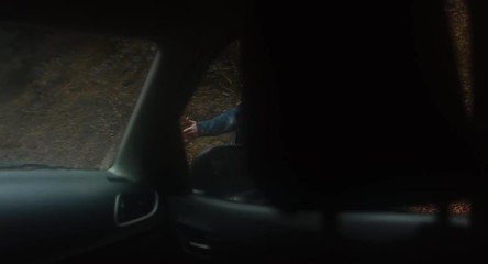 POV Car driver stops to pick hitchhiking girl on a forest road in mountains. 4K UHD 60 FPS SLO MO
