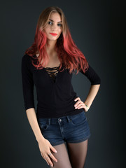 Fototapeta premium girl with long red and shiny wavy hair . Beautiful model with curly hairstyle .
