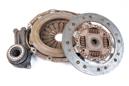 Old used clutch kit on the white background