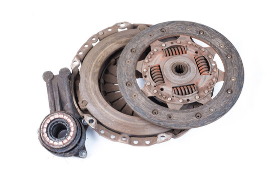 Old used clutch kit on the white background