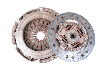 Old used clutch kit on the white background