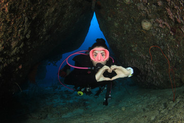 Young woman scuba diving