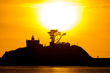 Fototapeta na wymiar sunset with lighthouse