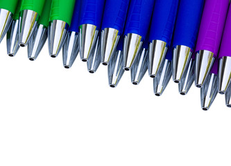 Colored pen on a white background with copy space