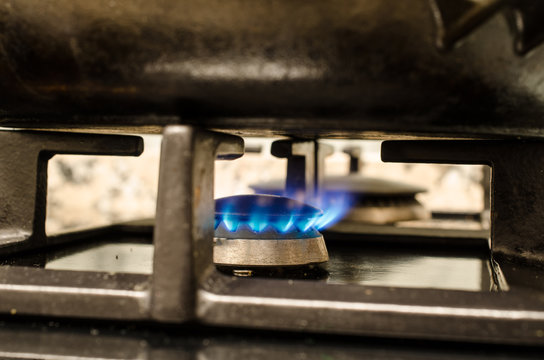 Iron pot on burning stove