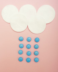 Blue colored sweets raining from cotton clouds:Blue rain drops falling from cotton clouds,Rainy days concept