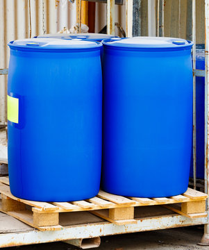 Two blue scratched barrels