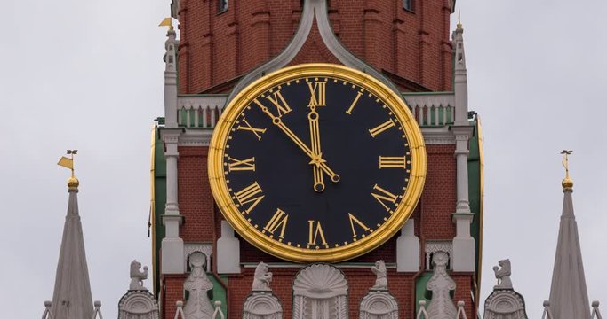 Moscow Kremlin Main Clock named Kuranti on Spasskaya Tower 12 hours . Red Square. Timelapse.