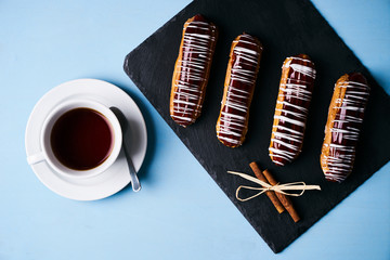 Four sweet french eclairs