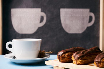 Eclairs and a cup of tea