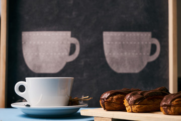 Eclairs and a cup of tea