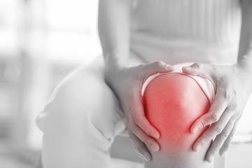 Soft focus of  knee joint  of woman get hurt and pain.